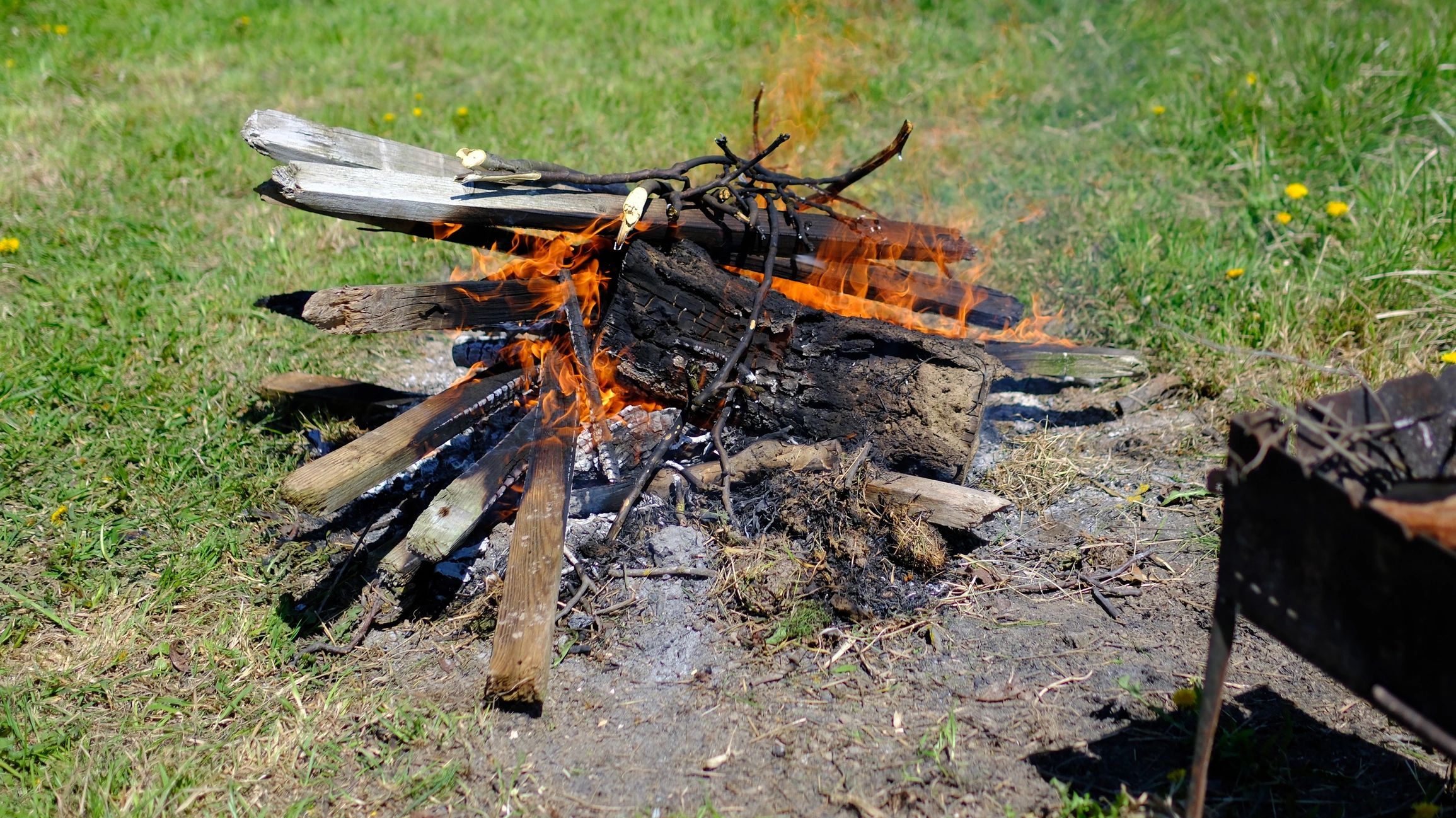 Fire burning in a backyard grill