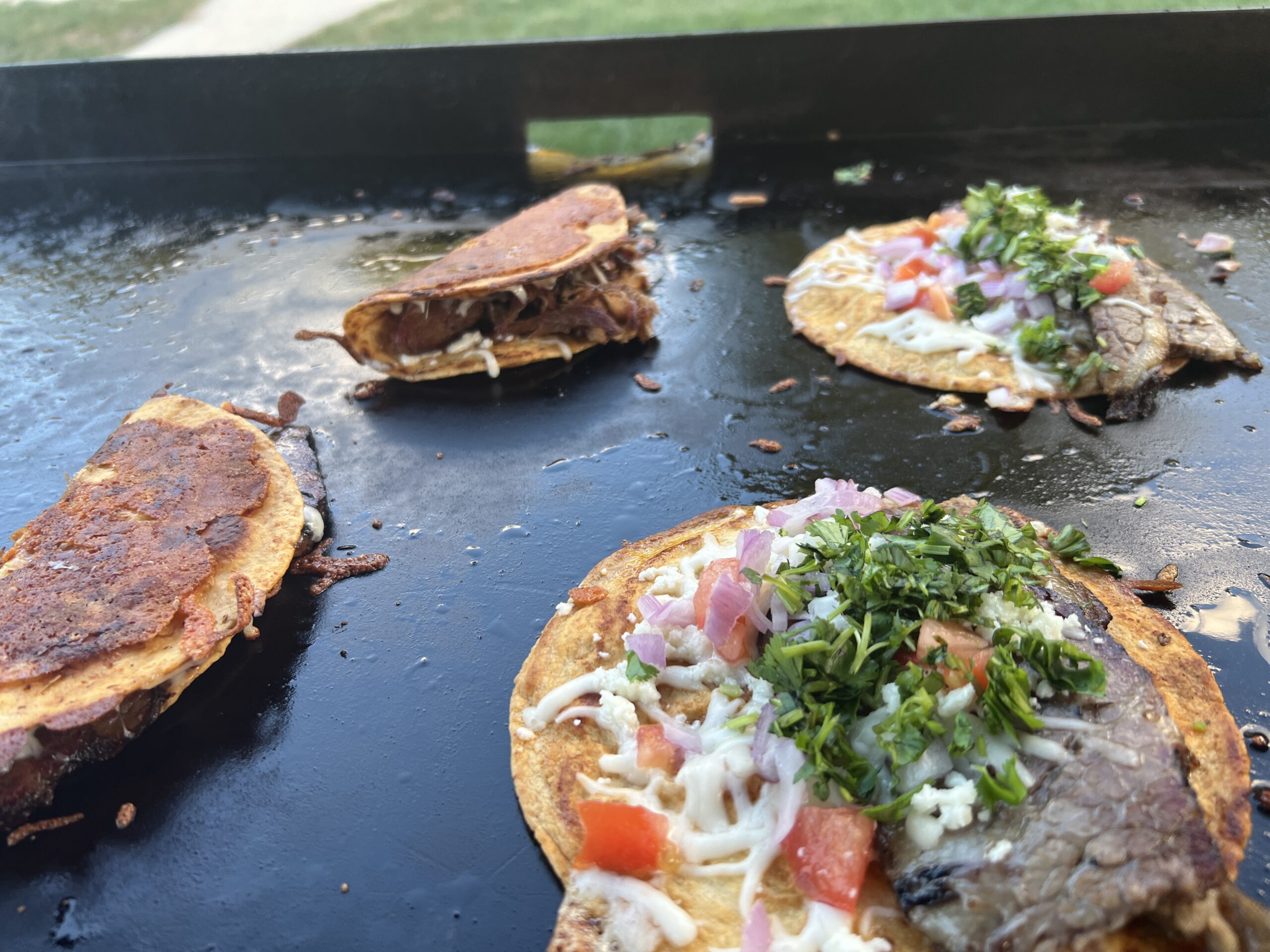 Backyard griddle cooking scene for Backyardgriddle.com
